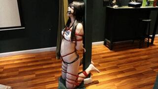 The barefoot girl in her restrictive underwear vibrated until she reached orgasm.