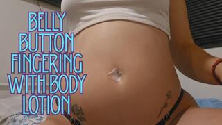 Fingering my belly button with body lotion