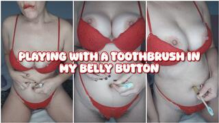 Playing with a toothbrush in my belly button