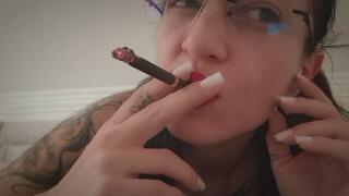 I Smoke, Blowing Cigarette Smoke Directly in Front of You.