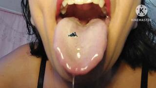 SALIVATING GIANTESS VORE GIANTESS HAS A TINY SWIMMER ON HER LONG WET TONGUE EATS HIM SHORT CLIP avi