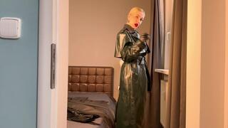 Leather goddess tries on her leather coats