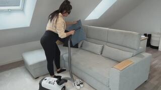 Miss Cookie vacuums her Couch