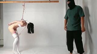 yumi11-The girl was suspended by her hands and brought to orgasm with a vibrator.