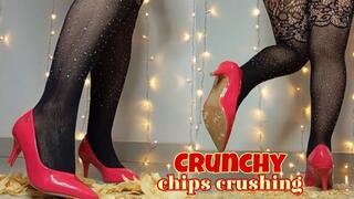 Red heels stomping on and crushing crunchy chips