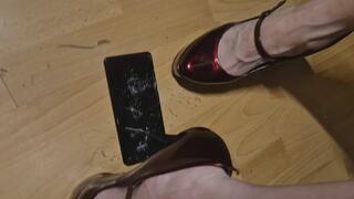 Destroying phone red stilettos