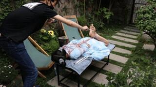 GG46 - In a beautiful garden, a barefoot girl with pigtails is bound and being tickled.