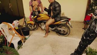 Dominant motorcyclist and his car wash slave