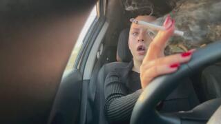 Smoking long white Parlament in my car