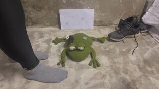 Trampling expensive stuffed toy with my sweaty socks