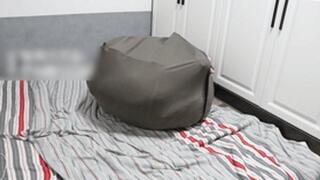 GG54 - A cute girl stuffed herself into a very large sack.