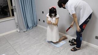 GG58 - A short-haired, barefoot girl in sandals is bound by shackles and shackles.