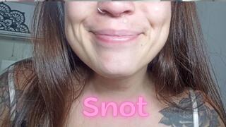 Thick, shiny snot... I slowly pull it out so you can see it properly.