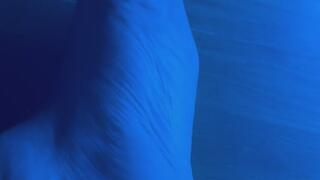 Left Foot Under Colored Lights