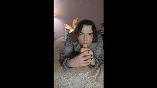 Nonbinary femboy does some throat training while doing "The Pose"