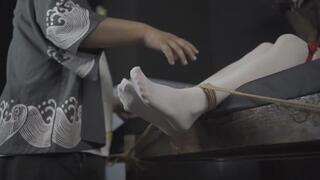 xr142c-The girl was tied to a chair and her feet were tickled