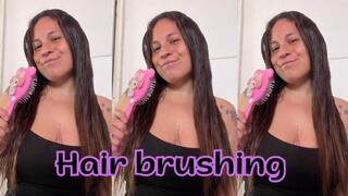 Brushing my hair... very slowly until your skin tingles.