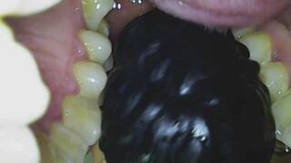 I use the retractor and the endoscope, crushing the doll's face with sharp canines