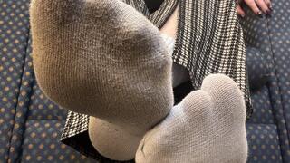 Giantess Takes Off Her Shoes To Reveal Sweaty Socks
