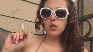 Sexy Goddess D in Gold Bikini Top Smoking Marlboro Red 100 - Vertical Video