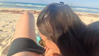 MILF sucks cock and swallows cum on the beach POV