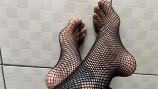 stepping on you with fishnet stockings