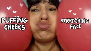 Puffing out my cheeks and stretching my face with balloons