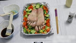 The Asian girl is bound under the table, her bare feet tied to the tabletop. We're going to lick these bare feet; let's start by sprinkling some seasonings and side dishes.