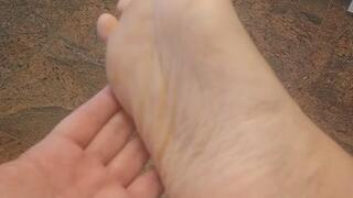 Pulling off my white sock and showing my beautiful big sole