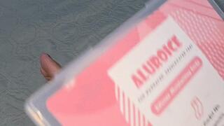 Milah playing with her newest silicon socks for moisturizing her sublime feet