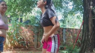 Wearing out her flat stomach