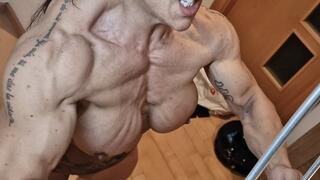 fbb huge chest ripped chest feats of strength bending wood breaking veiny legs quads calves pecs ripped pumped