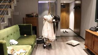 GG122-A cute Asian maid in white stockings has her mouth plugged with an inflatable gag and is being inflated until it's completely full. She's then hung up by a rope, ready to be whipped by her master.