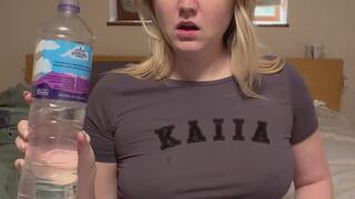 Chugging water, burping and showing bloated belly