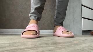 Feet in pantyhose and slippers!