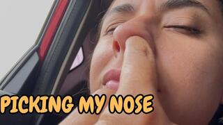 Picking my nose in the car