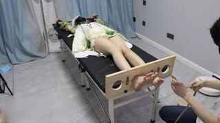 GG126-Asian girl cosplay, barefoot and bound to a bed, tickling her feet, upper body.