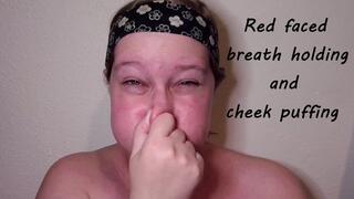 Red faced breath holding and cheek puffing