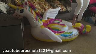Nastya, barefoot and in white tights, brutally tramples an inflatable pegasus, trampling foot fetish crush fetish crushing
