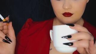 Anna chain smokes in total red