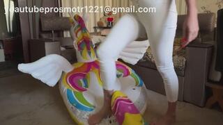 Nastya, barefoot and in white tights, brutally tramples an inflatable pegasus, trampling foot fetish crush fetish crushing second angle