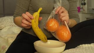 I'll peel the banana and orange and eat them because they're delicious.