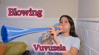 Blowing Vuvuzela