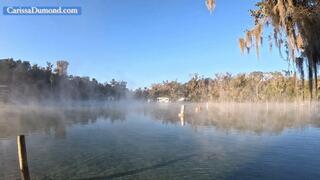 Carissa in the pink and white wet suit in the springs