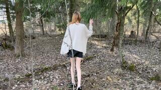 a thin long-legged girl got lost in the forest in a miniskirt and black patent leather shoes with high heels, she overcomes obstacles and loses her shoes