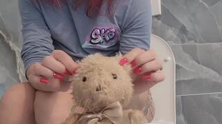 The impatient bear is waiting for Crystal to come and receive the yellow juice from her