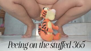 Peeing on the stuffed 365