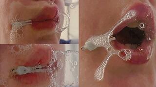 The Giantess Winter Rescuer is a tiny frozen human being, warmed by her breath, lips, and saliva