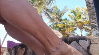 Magnificent feet with pronounced arches modeled on a beach (1)