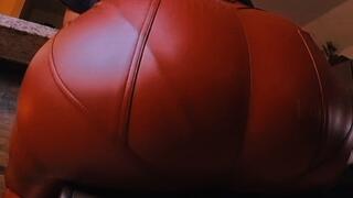 Farting on a chair in leather pants